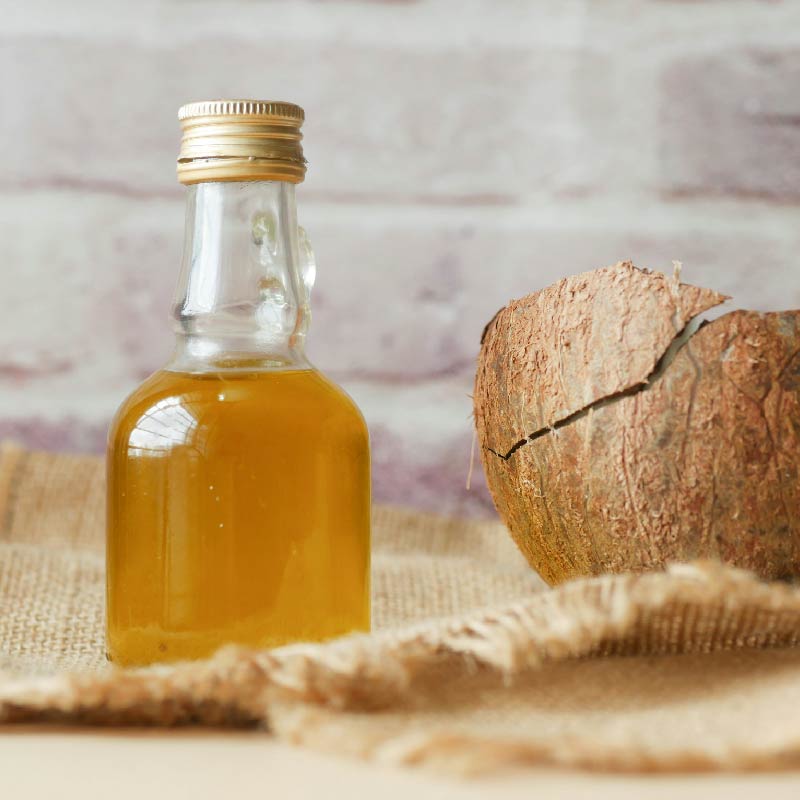 Ayurvedic perspective on sesame oil usage for oil pulling and against coconut oil.