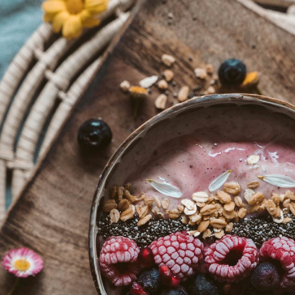 Acai Bowl with edible flowers for delicious 7 Day Weight Loss Plan